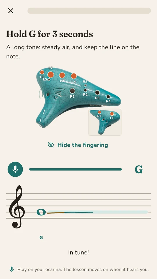 A lesson asking to hold G for 3 seconds, with the pitch drawn as a line on the staff